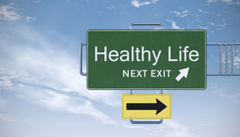 Road sign saying Healthy Life next exit